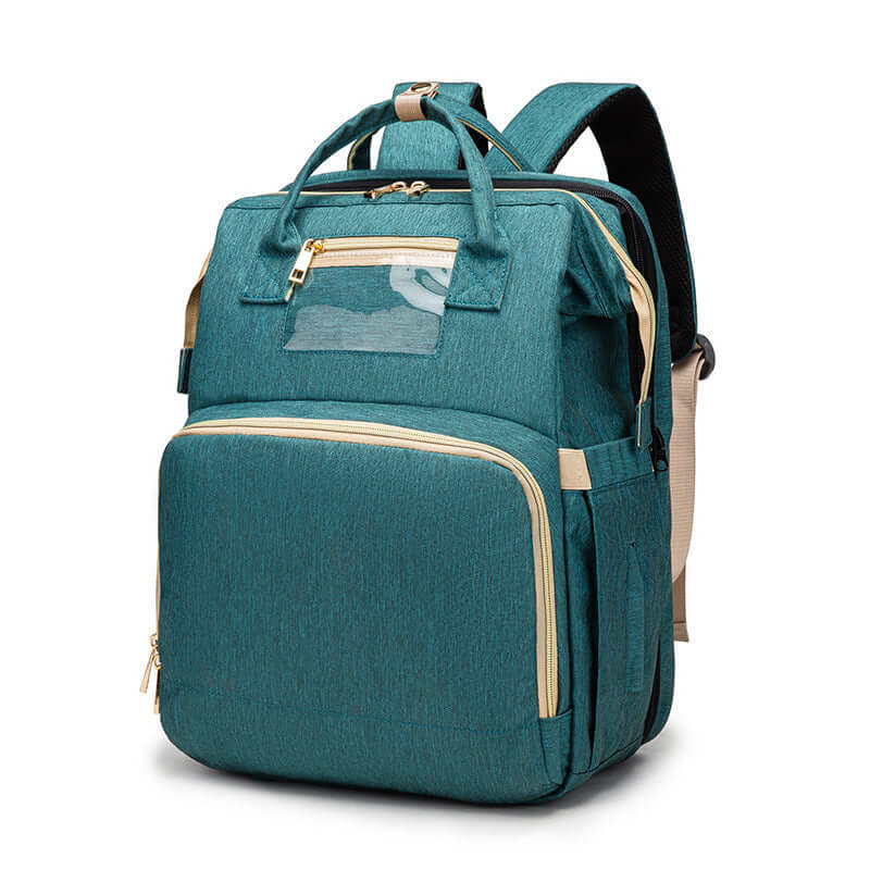 Sac à dos pliable multifonction avec chargeur USB, idéal pour les mamans, en tissu turquoise.