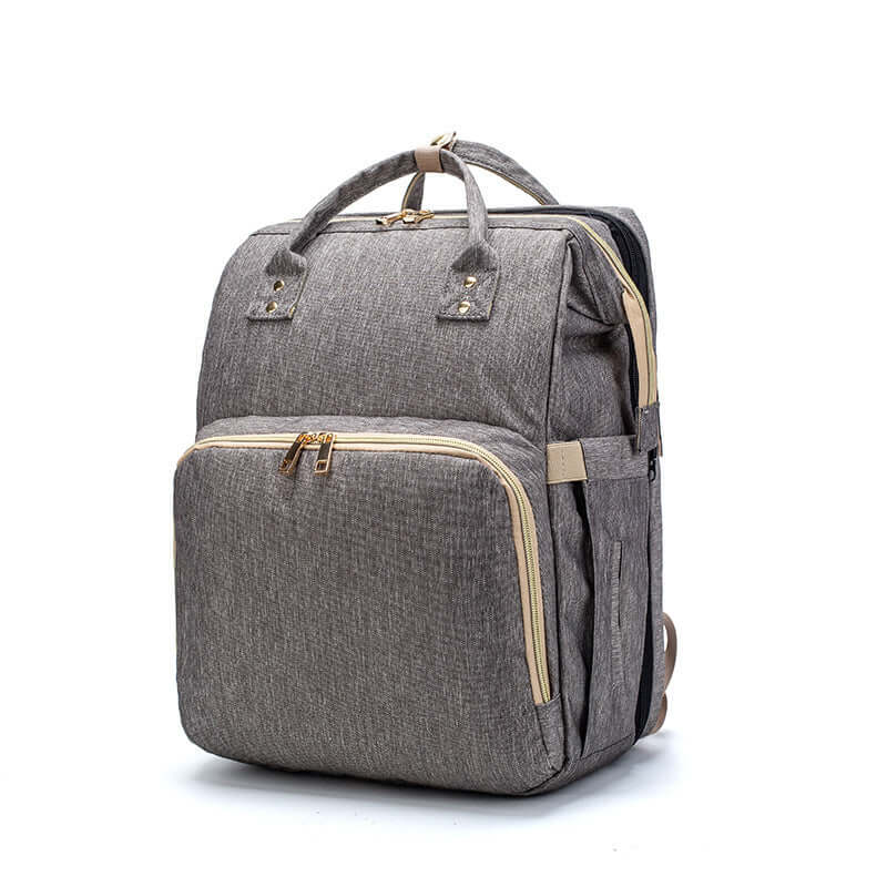 Sac à dos pliable multifonction avec chargeur USB, idéal pour maman en déplacement.