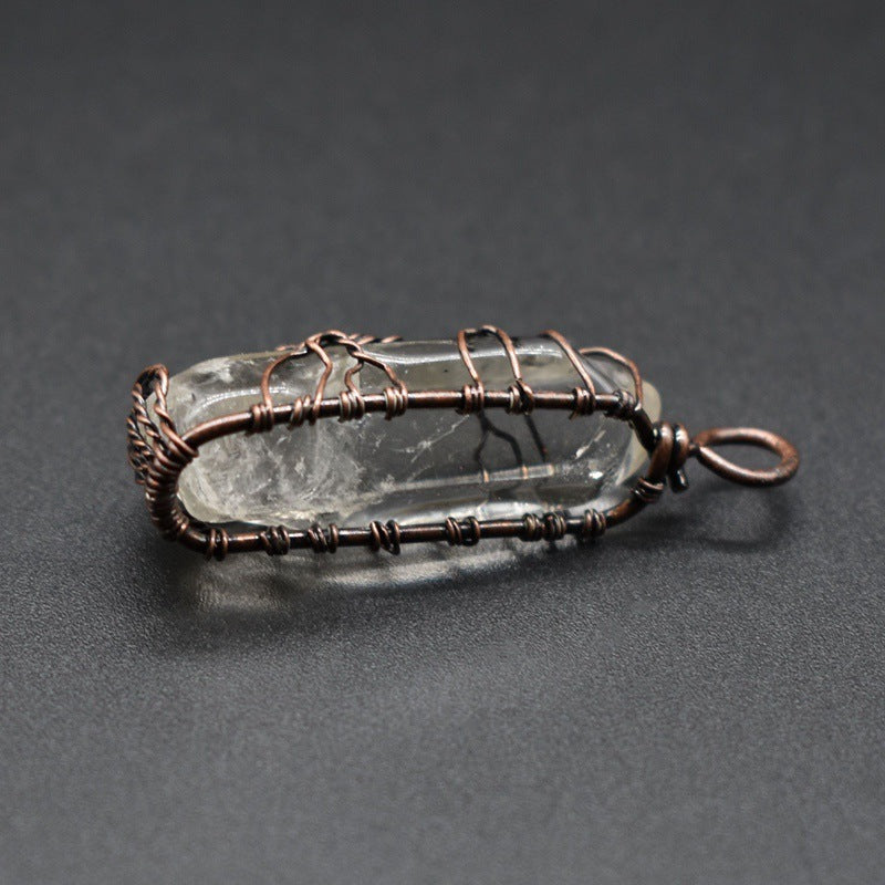 pendentif en forme de pilier en cristal et arbre de vie